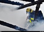 V Janovicích hořely tři chaty, v jedné našli hasiči mrtvé tělo